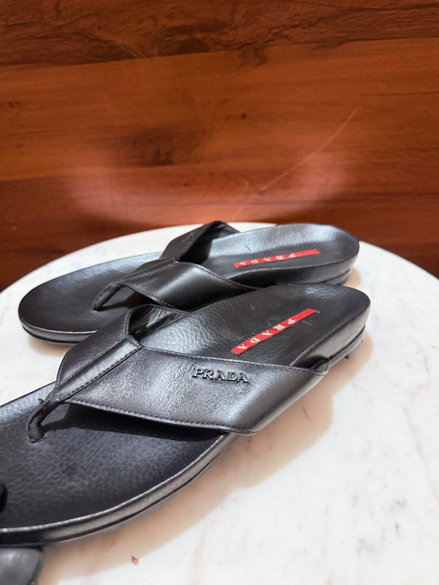 Prada Linea Rossa Metal Logo Leather Flip-Flop Sandals