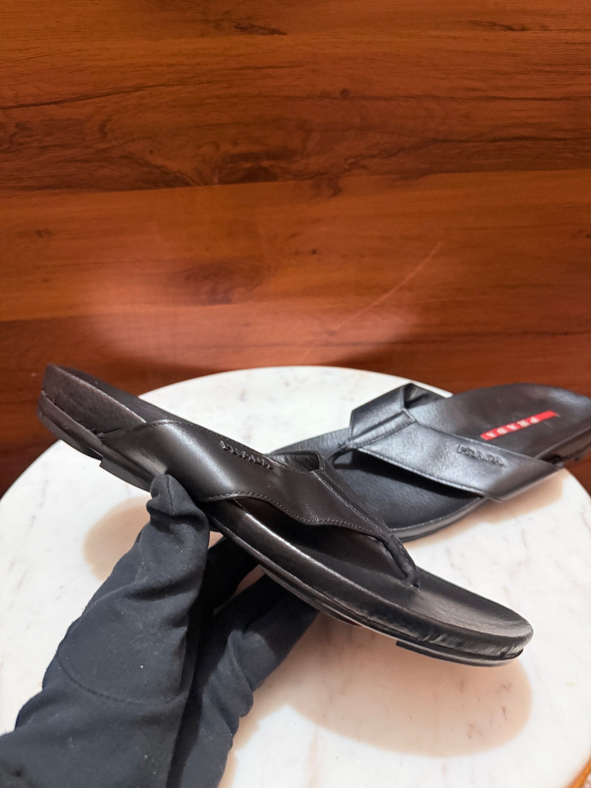 Prada Linea Rossa Metal Logo Leather Flip-Flop Sandals