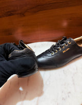 Prada Gold Hardware Leather Low-Top Sneakers
