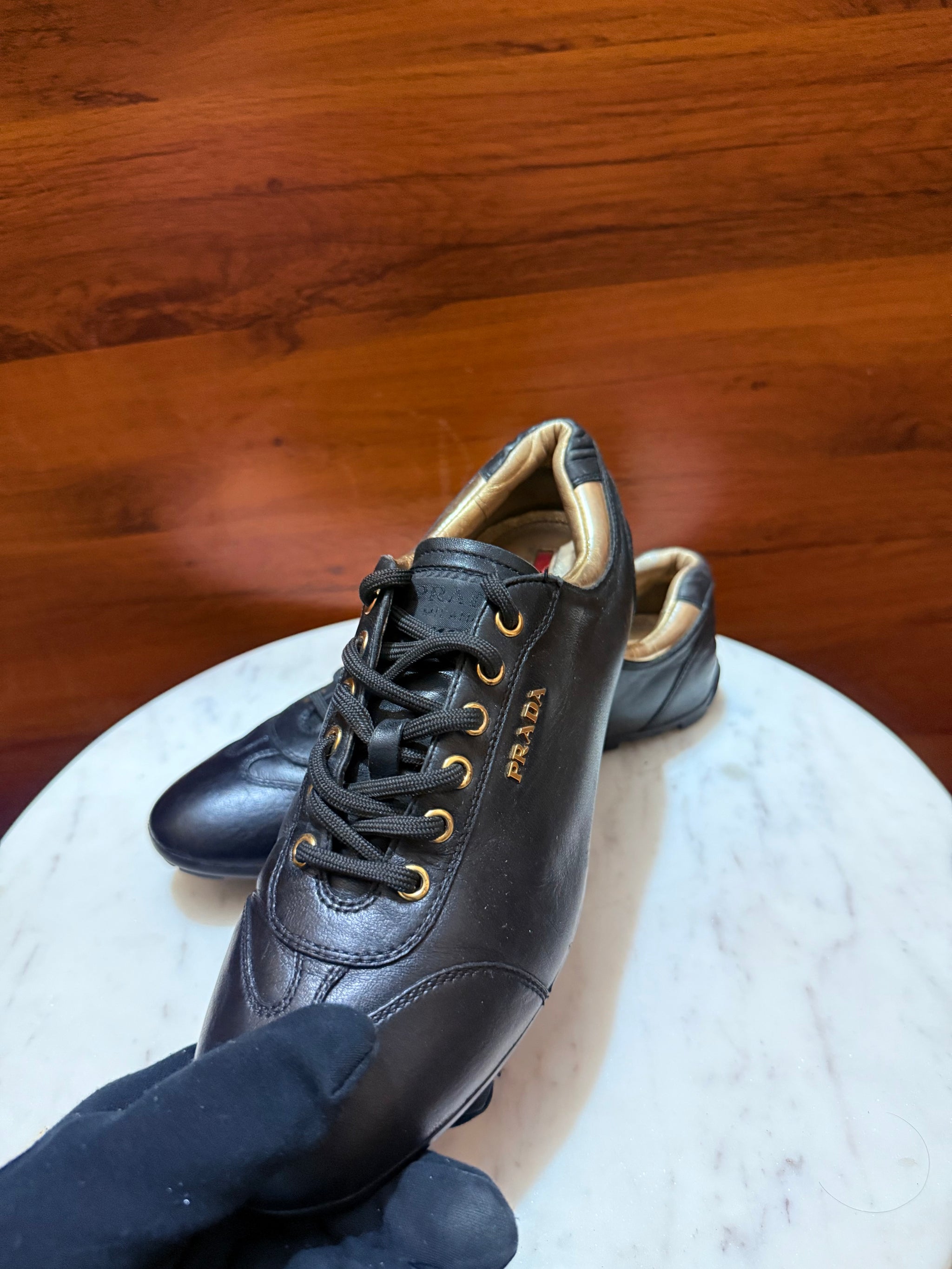 Prada Gold Hardware Leather Low-Top Sneakers
