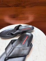 Prada Linea Rossa Metal Logo Leather Flip-Flop Sandals