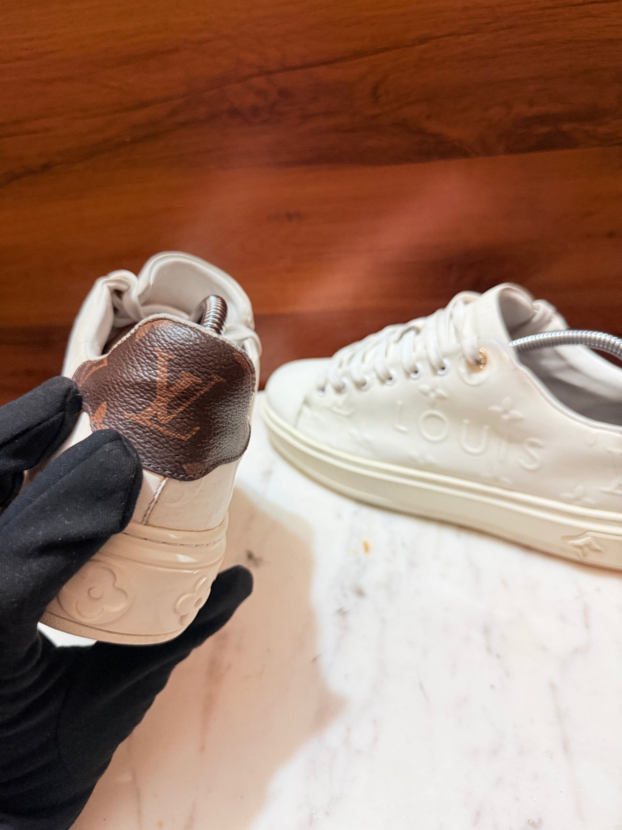 Louis Vuitton Time Out Monogram Embossed Leather Sneakers