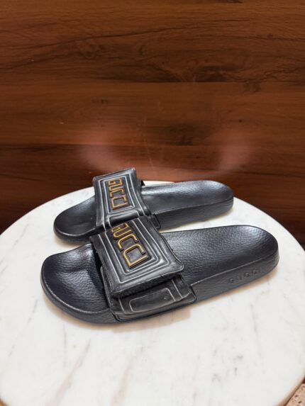 Gucci –  Vintage Logo Rubber Slide Sandals
