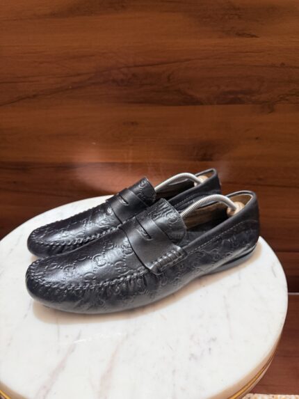 Gucci – Handcrafted GG Supreme Monogram Embossed Leather Penny Loafers